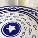 Decorative ceramic deep plate with fish decoration
