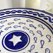 Decorative ceramic deep plate with fish decoration