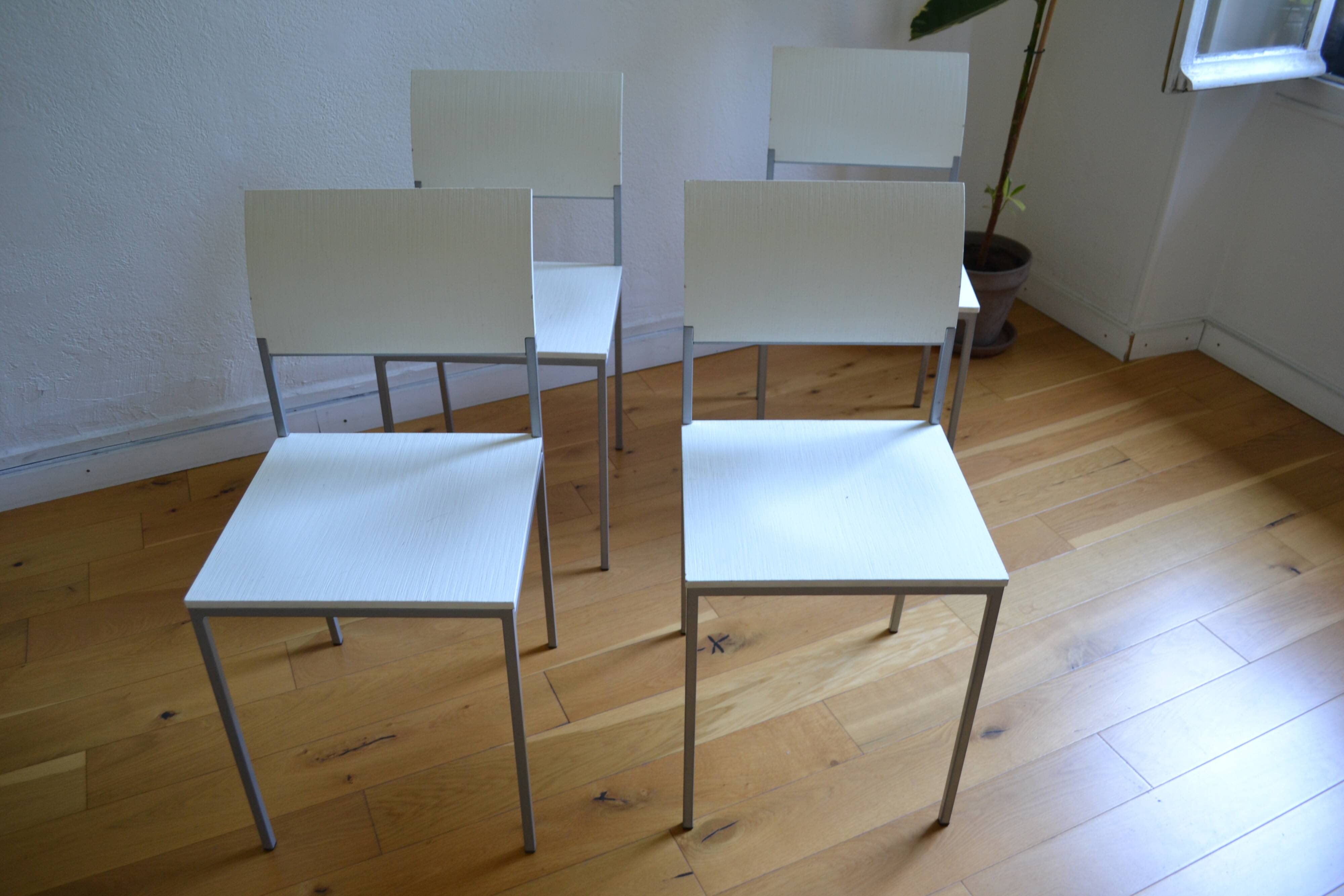 Set of 4 vintage metal and wood chairs from the 1990s.