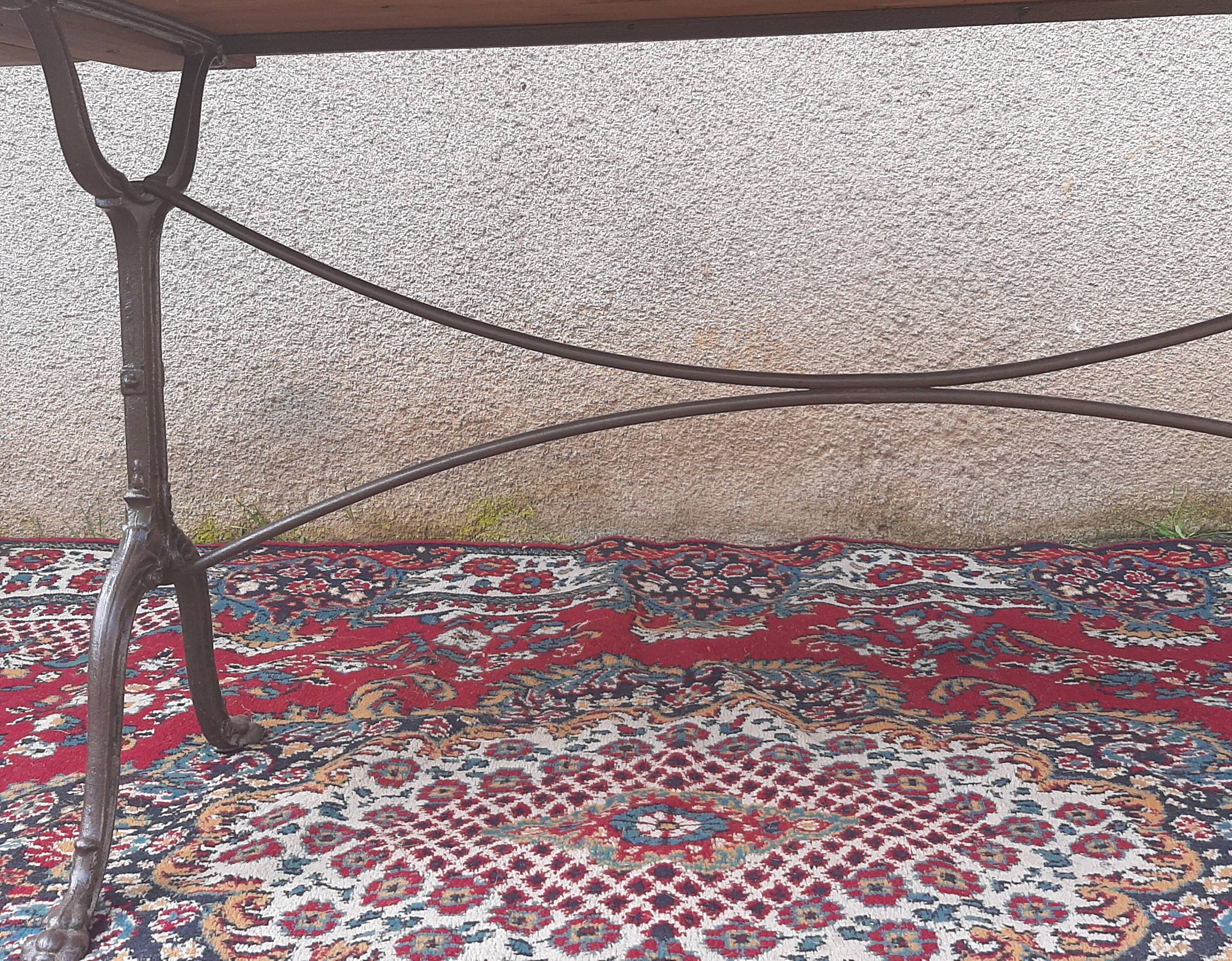 Large bistro table with cast iron legs and cherry top