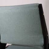 Vintage armchair from the 1960s in black wood and fabric.