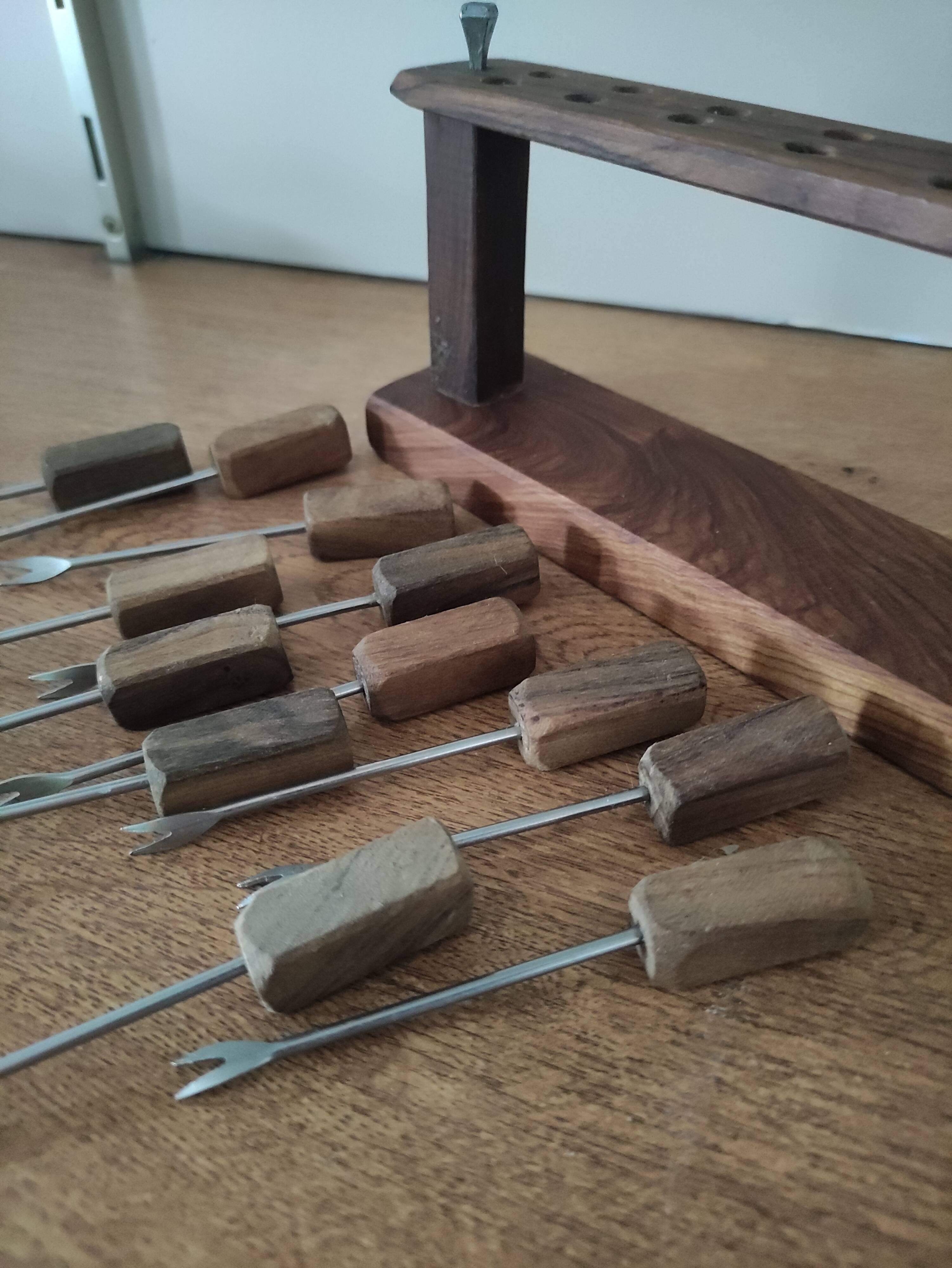 12 snail forks with wooden display