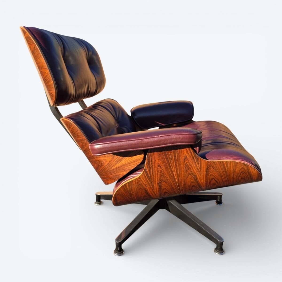 Original Eames lounge chair by Herman Miller in burgundy rosewood.
