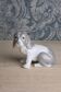 Petit chien épagneul en porcelaine