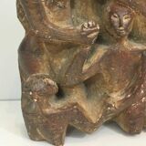 Plaster sculpture depicting a group of 3 figures