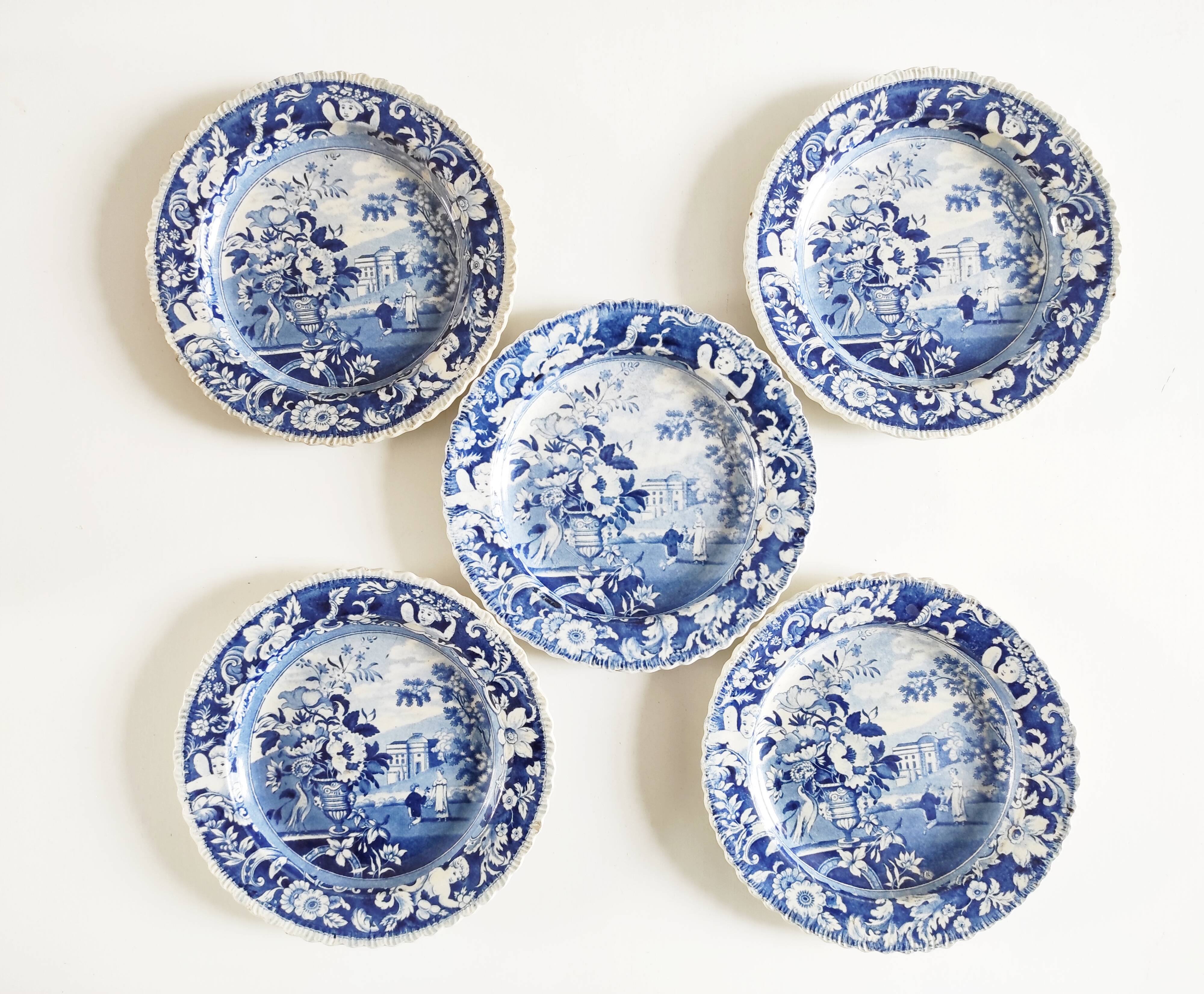 Five 19th century Calais earthenware plates with a romantic gallant couple decor