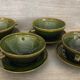 4 signed cup, cup and saucer sets