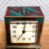 Zenith travel alarm clock with enamelled bronze case with Art Deco pattern
