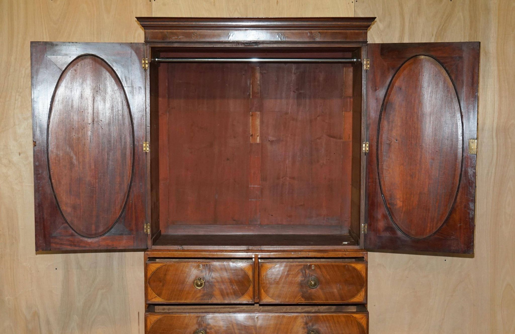 George III Sheraton linen cupboard in walnut, circa 1760.