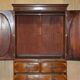 George III Sheraton linen cupboard in walnut, circa 1760.