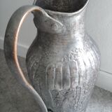 Old metal pitcher vase