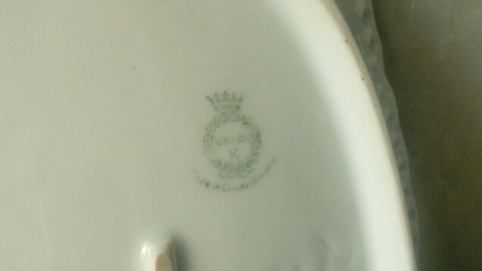 Openwork porcelain basket with fruit still life decor