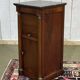 Empire bedside table from the 19th century in cherry wood and black marble.