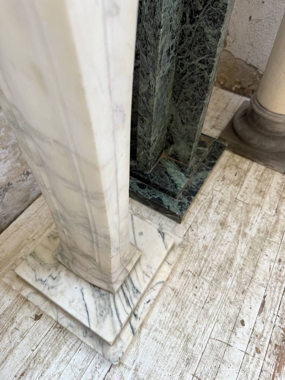 Set of 4 marble columns or pedestals.