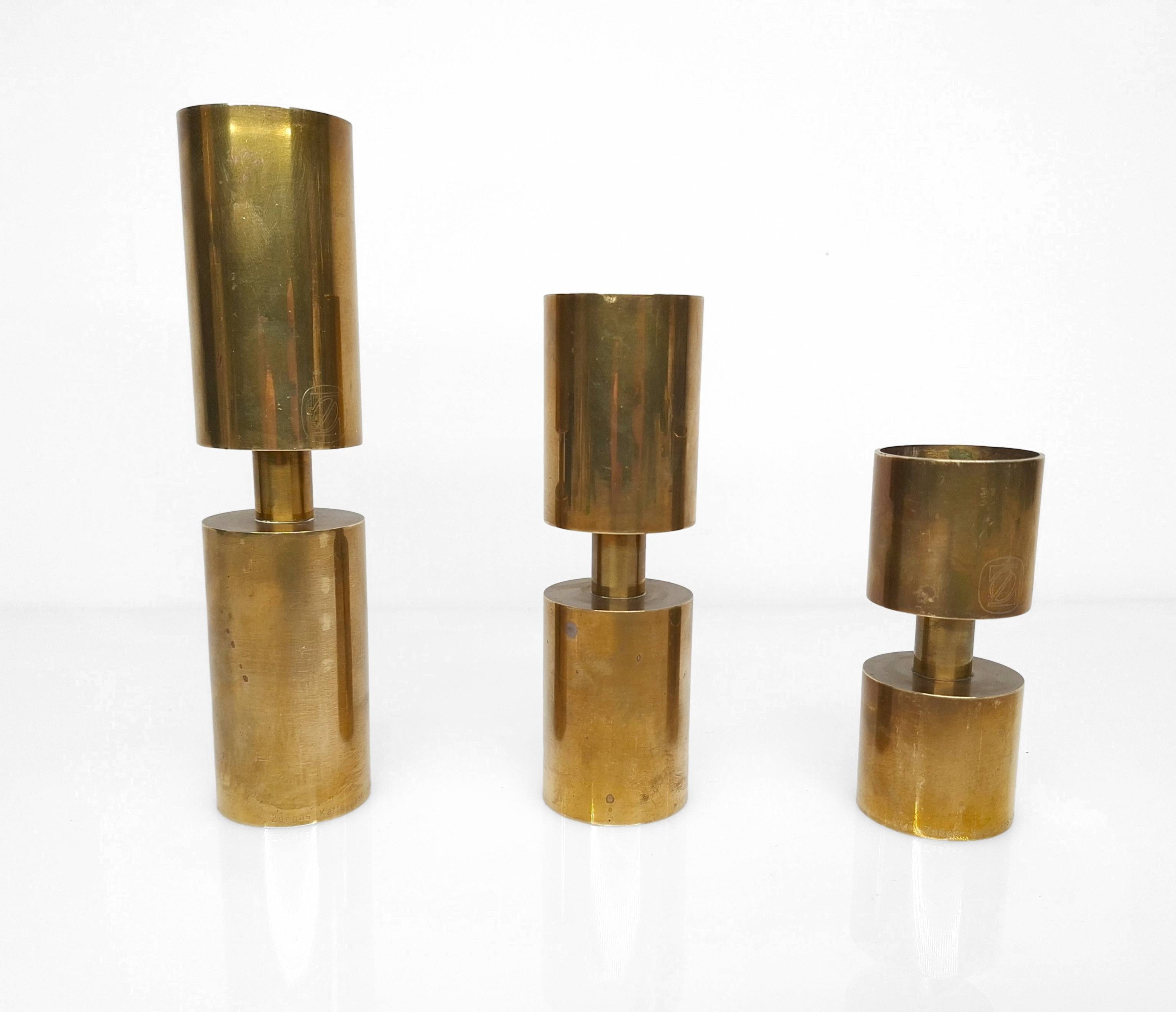 3 Scandinavian candlesticks in solid brass Thelma Zoega, Sweden, 1976