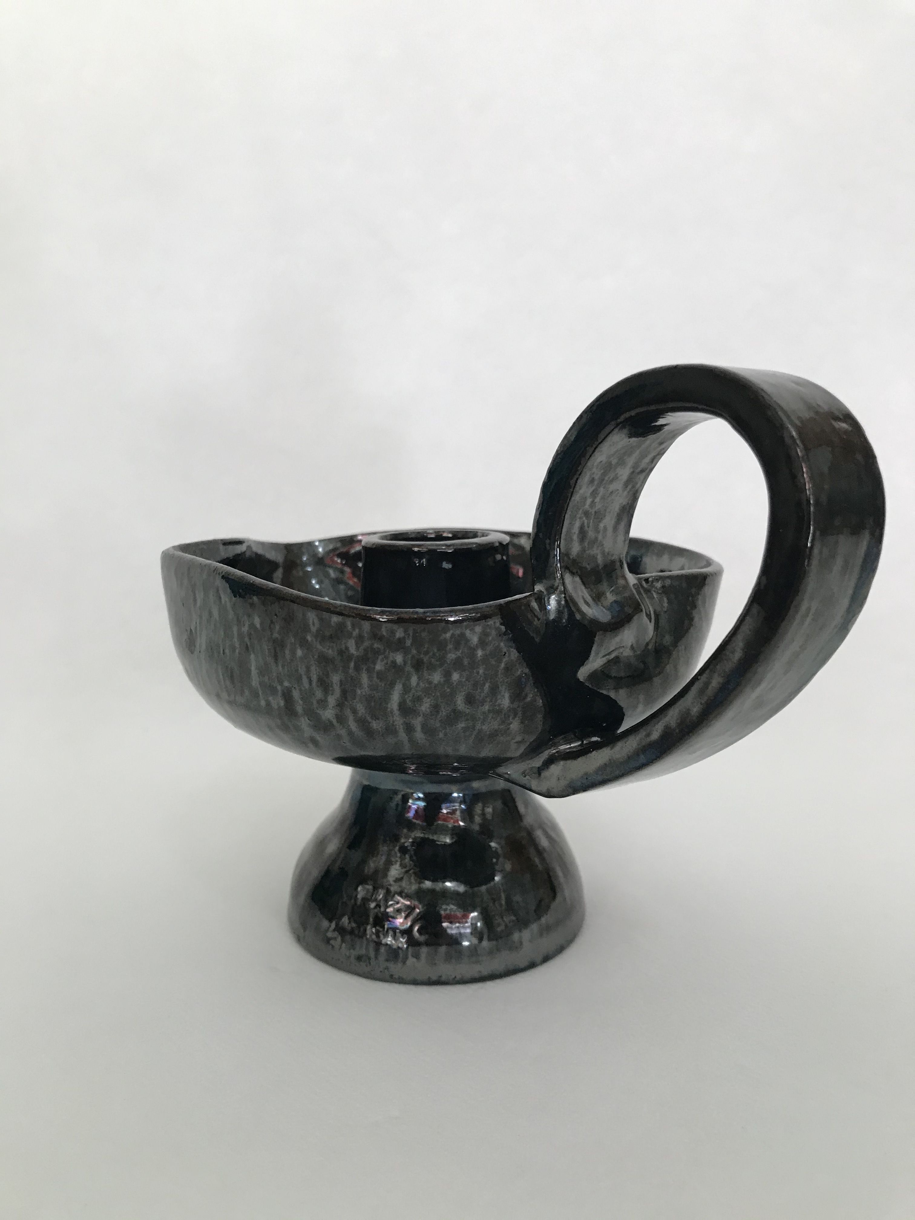 Black "hand- bougeoir with iridescents signed Fazio in Vallauris, circa 1950-1960