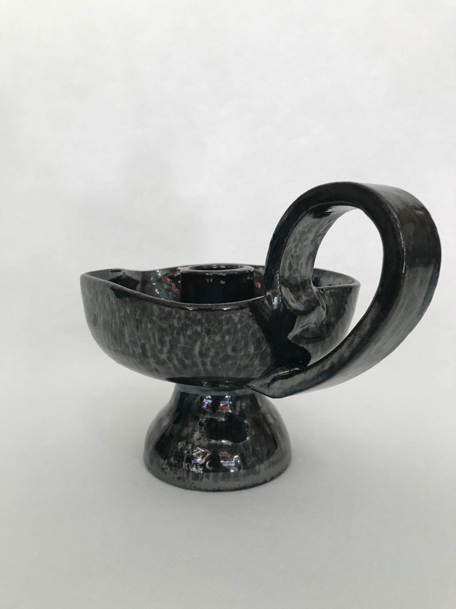 Black "hand- bougeoir with iridescents signed Fazio in Vallauris, circa 1950-1960