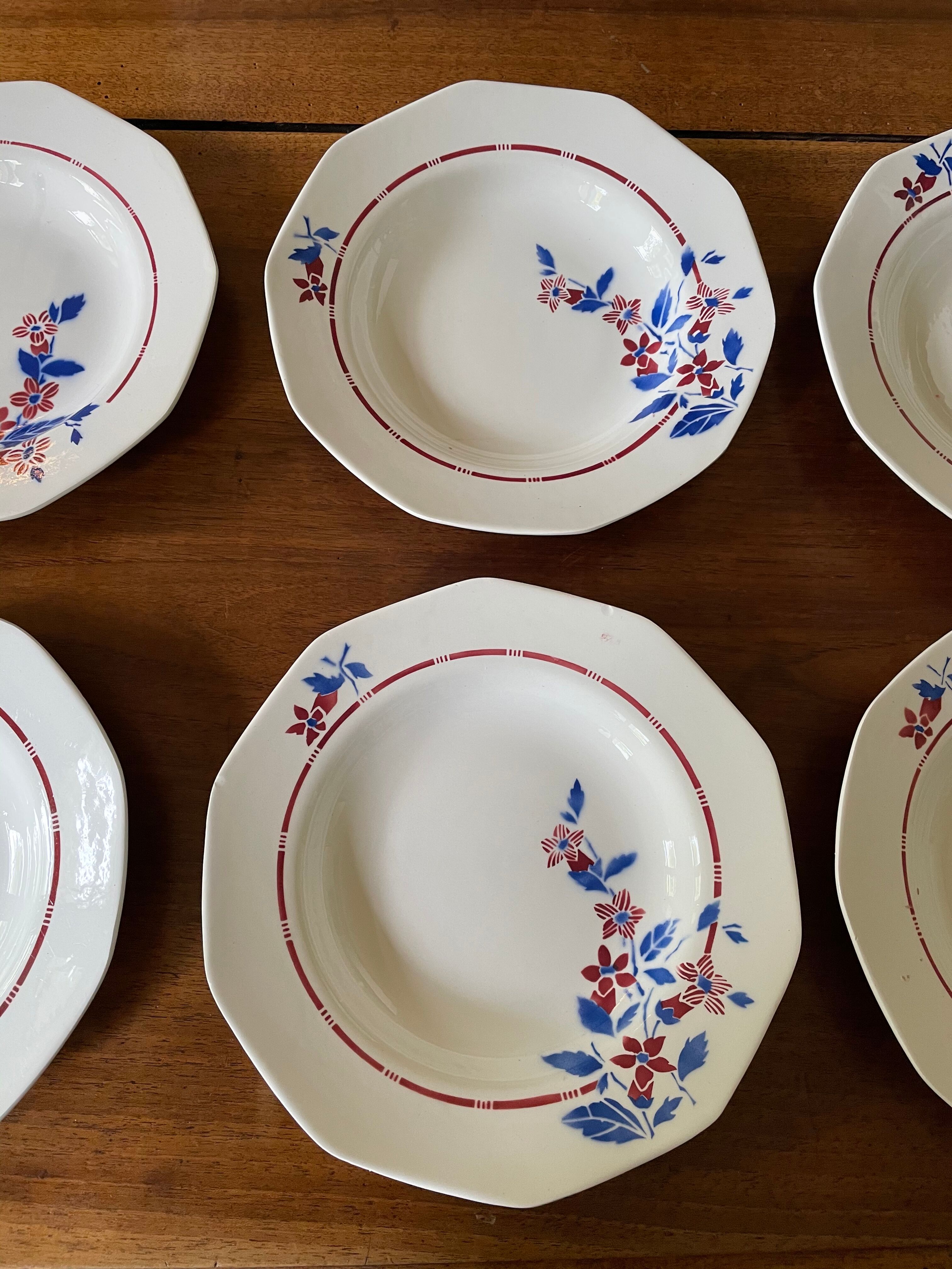 Saint Amand hollow plates decorated with red and blue flowers