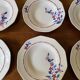 Saint Amand hollow plates decorated with red and blue flowers