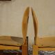 Pair of light wood chairs with post-formed seat and backrest.