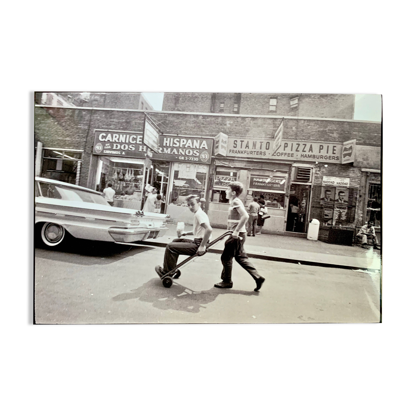 Little Italy – NYC 1964 A lively and spontaneous street scene.