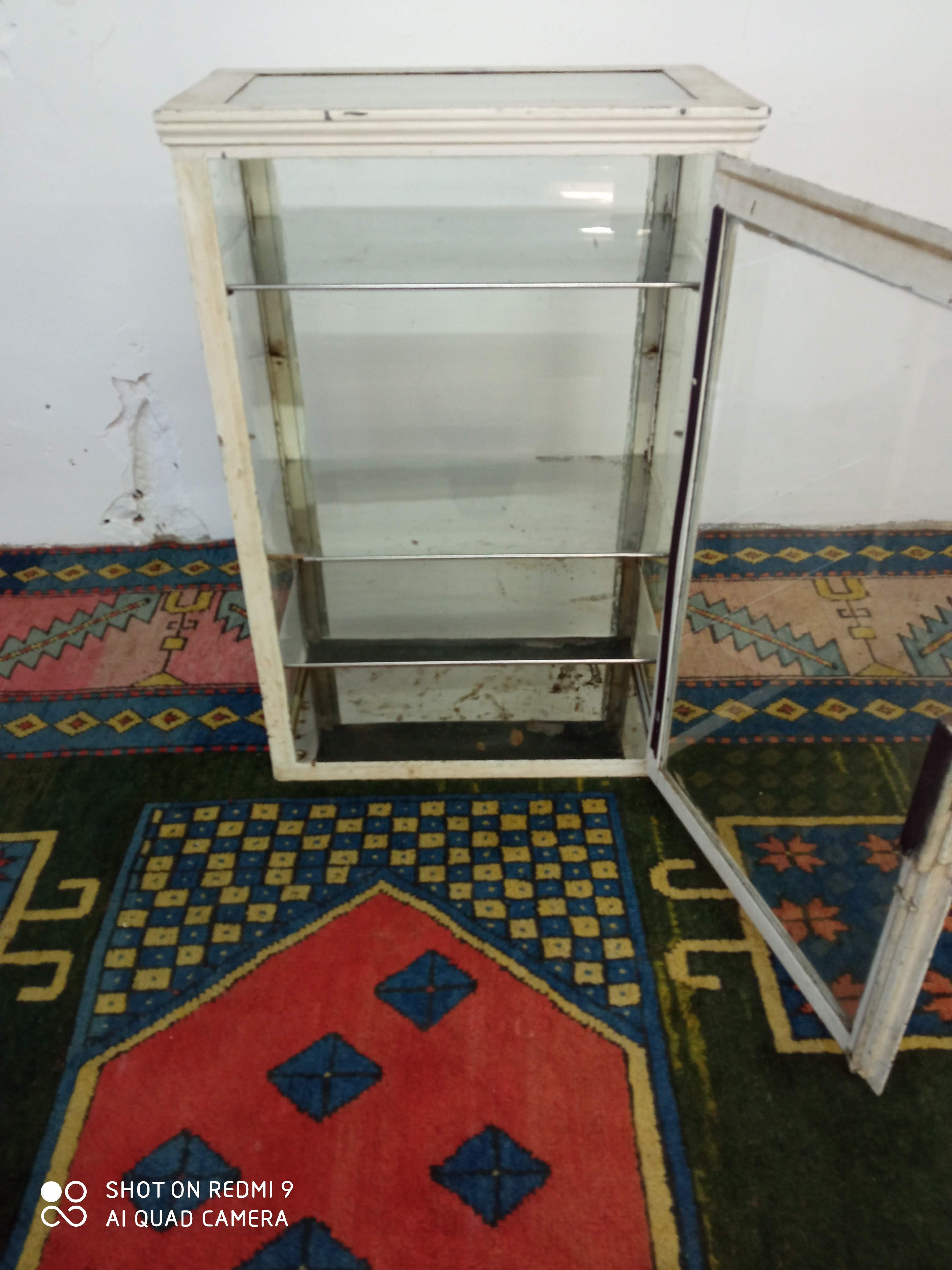 Ancient medical showcase in metal