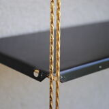 Shelf wall metal string