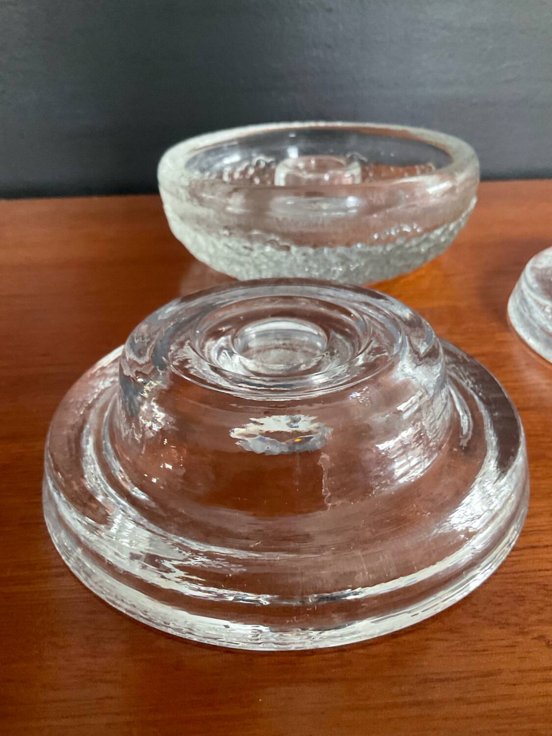 Set of three round thick moulded glass candle holders