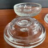 Set of three round thick moulded glass candle holders