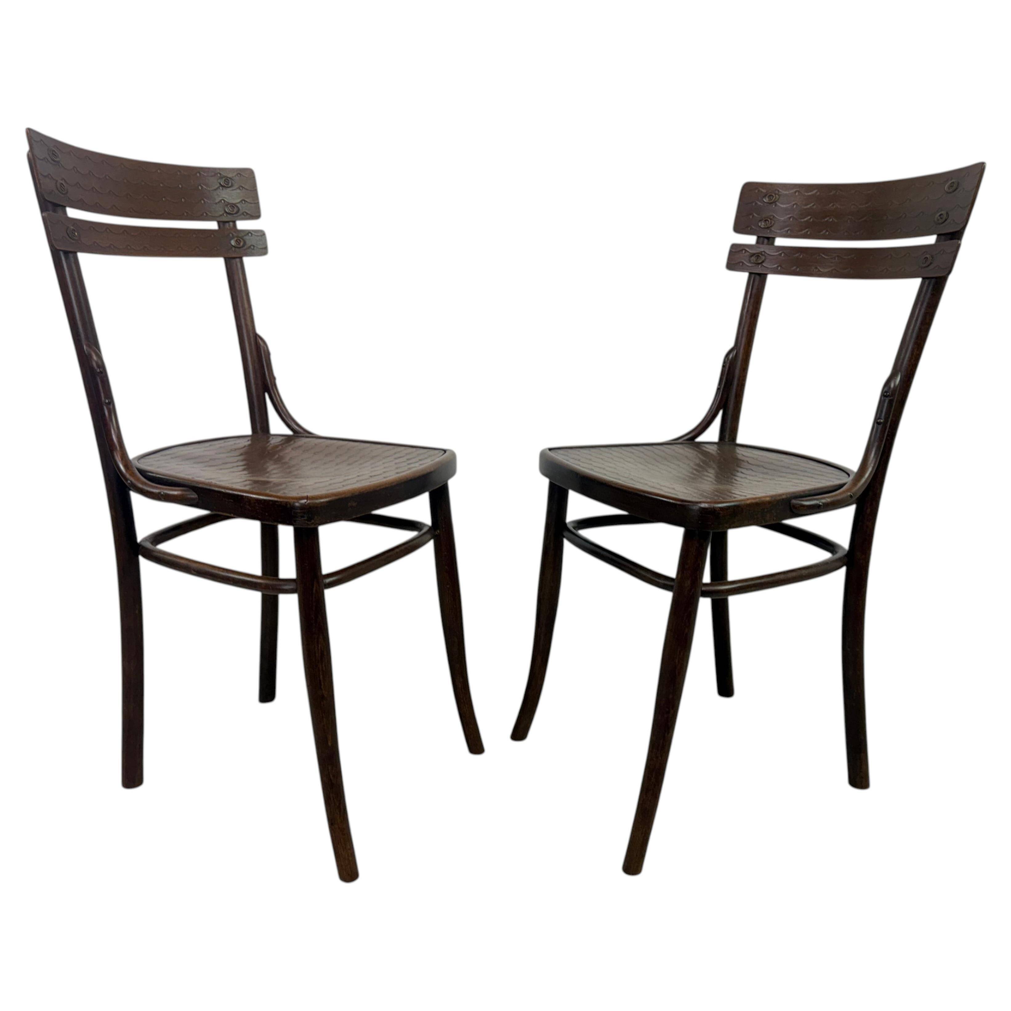 Set of 2 dining chairs by J&J Kohn
