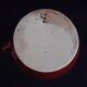 Old covered milk jug, side handle
