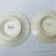 Pair of flat cut on foot faience white and blue