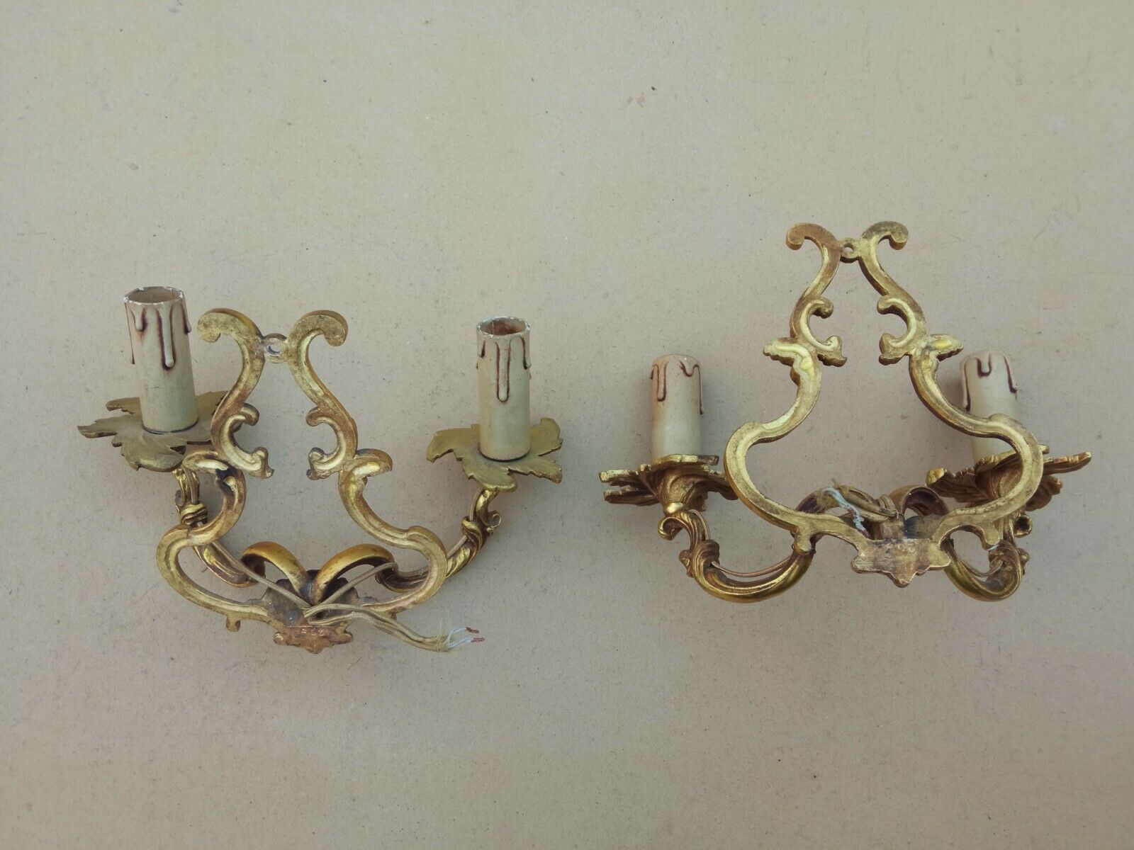 Pair of Louis XV style bronze cage wall lamps