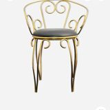 1960s brass and vinyl scroll chair