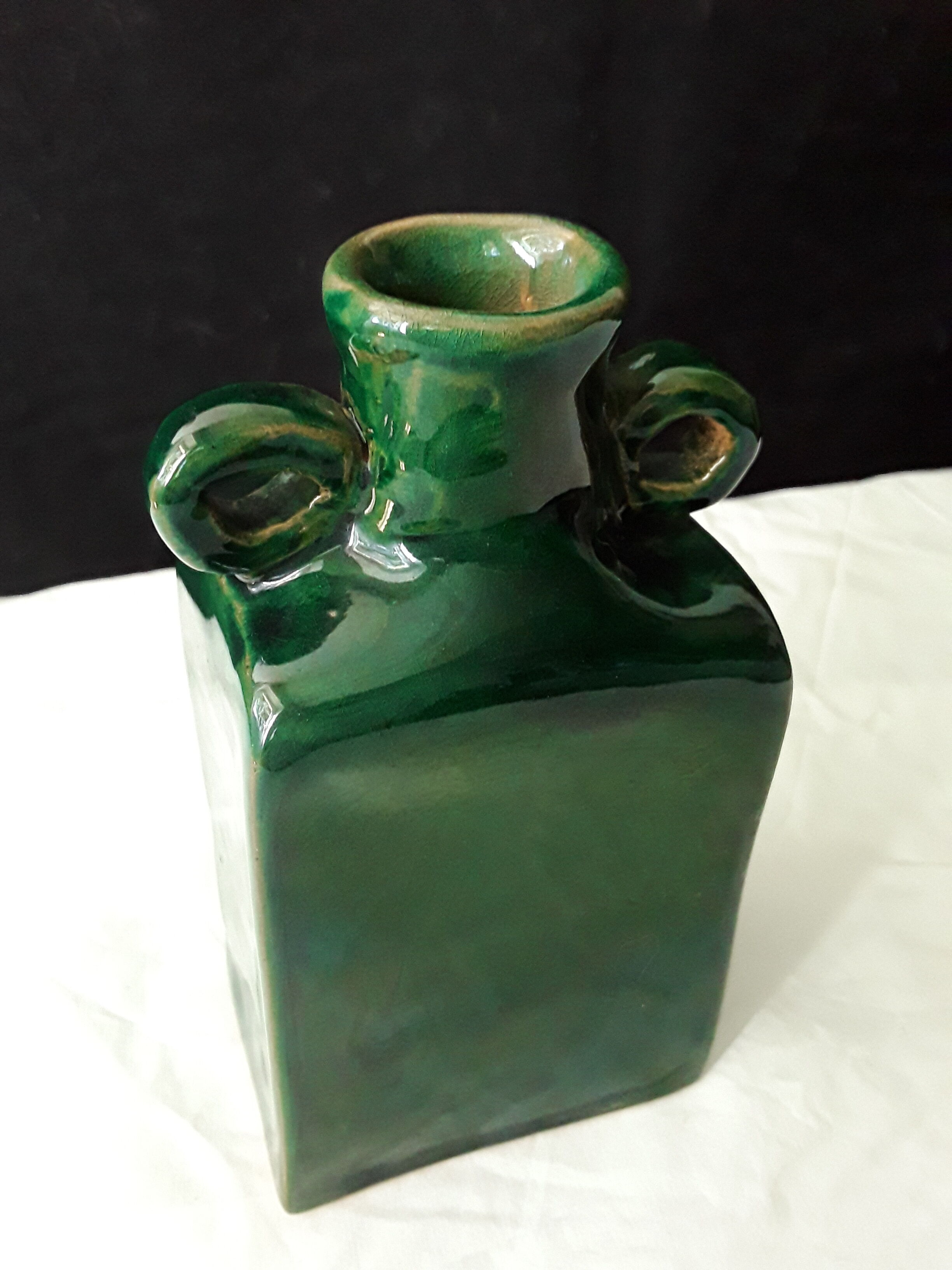 Vintage green vase with ears