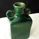 Vintage green vase with ears