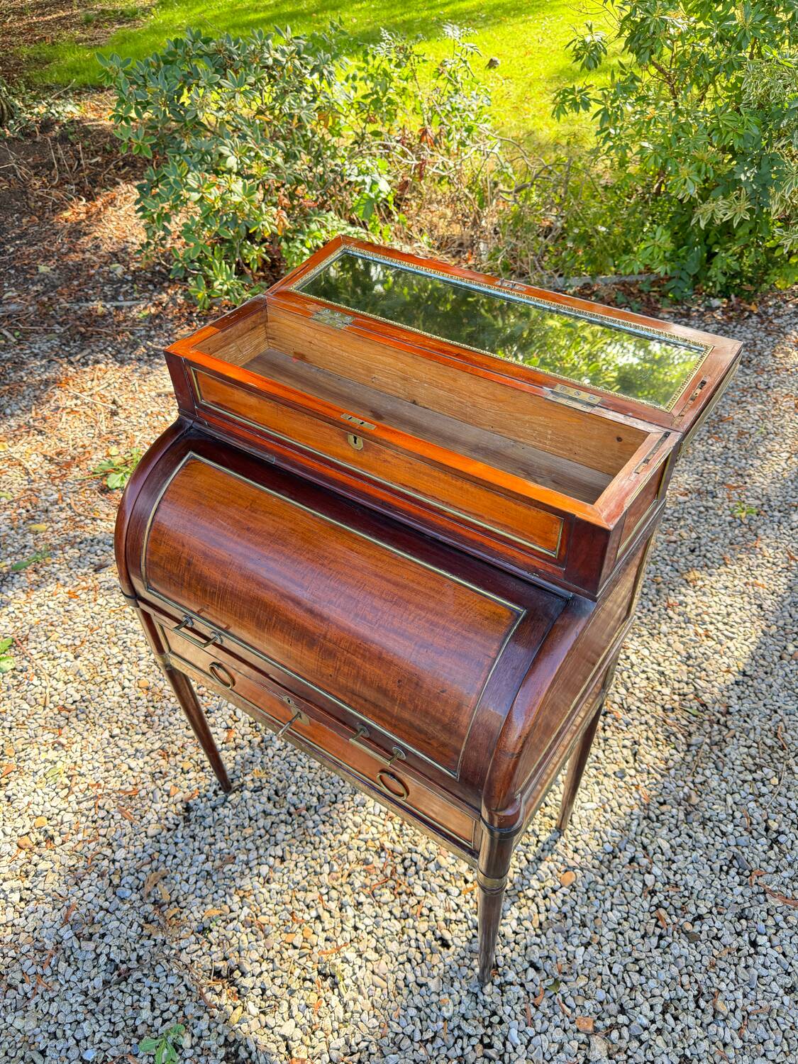 Elegant and rare Louis XVI period mahogany cylinder desk