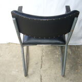 Old industrial chair in skai and metal