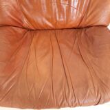 Four vintage armchairs, leather and fabric, 70s