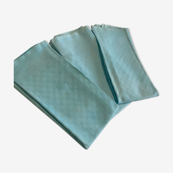 Three turquoise towels