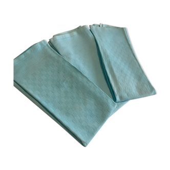 Three turquoise towels