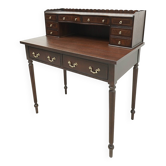A desk with an English-style chair. After professional renovation.