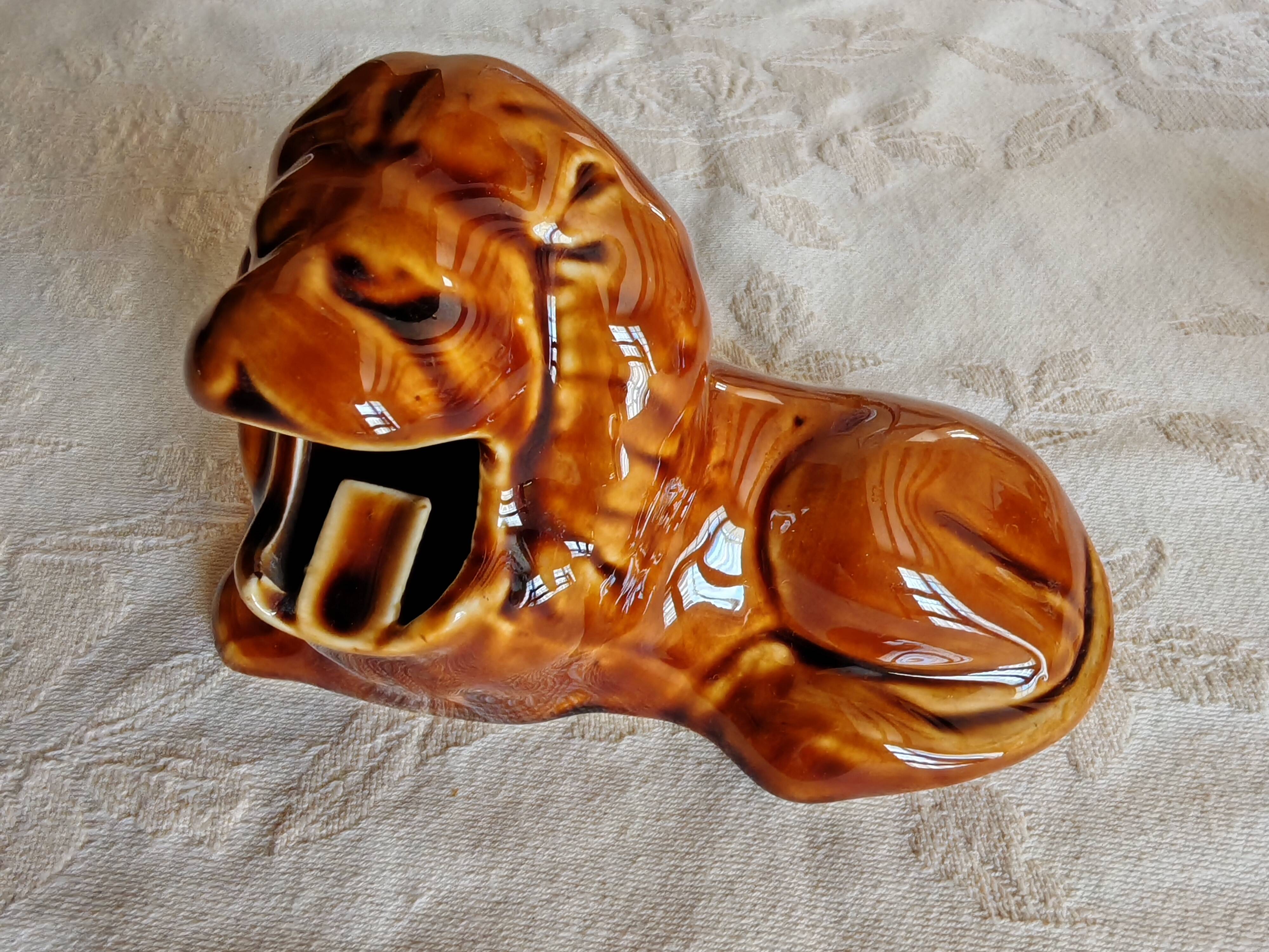Pair of vintage lion ashtrays