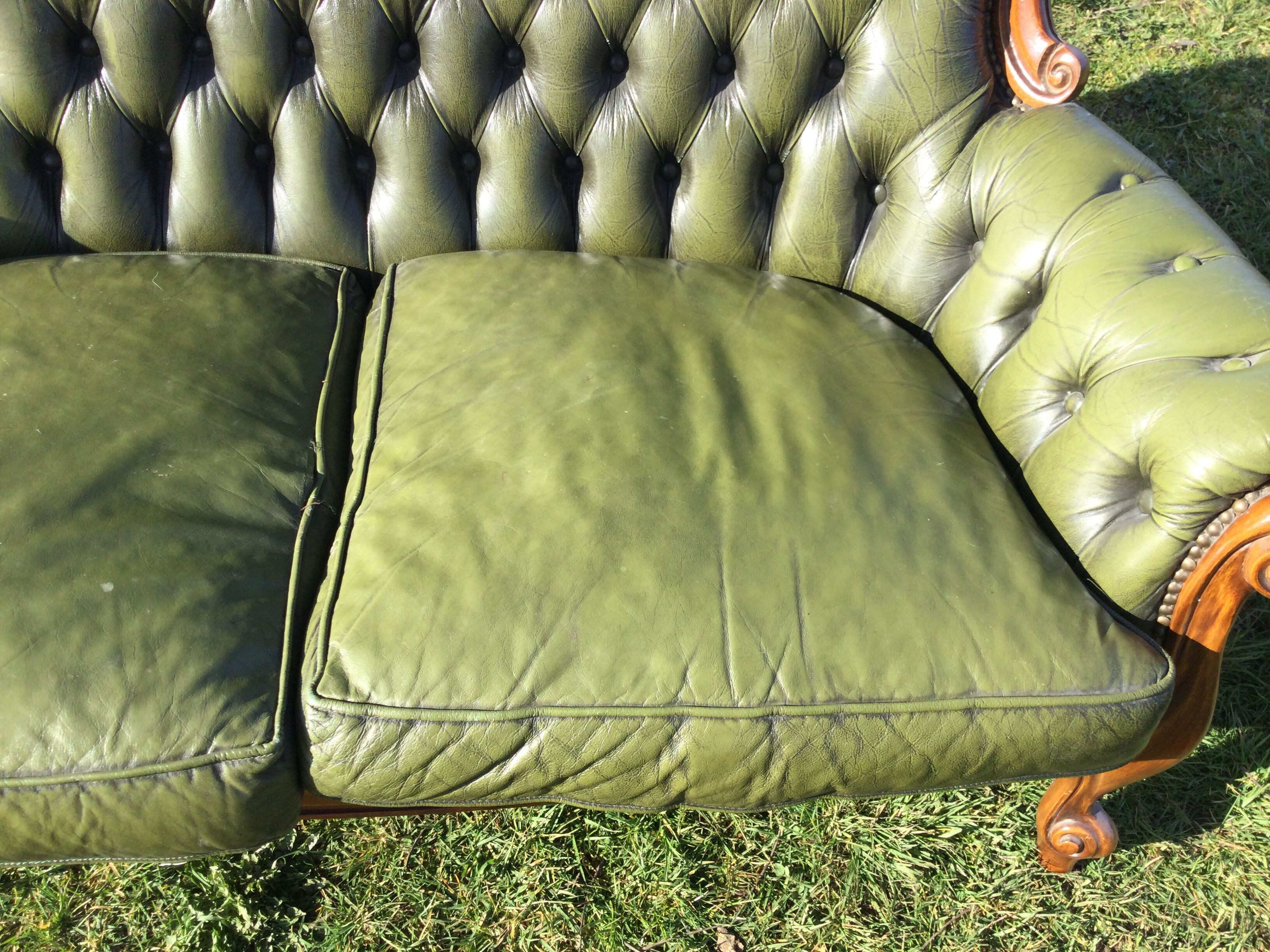 Wooden and leather chesterfield sofa