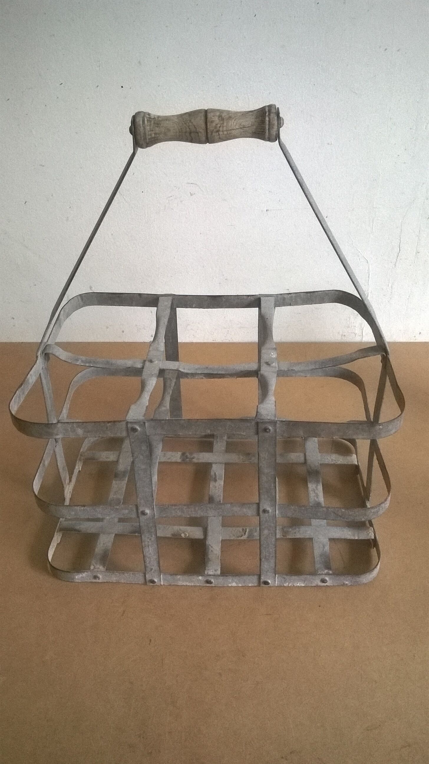 Old bottle rack in zinc