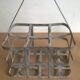 Old bottle rack in zinc