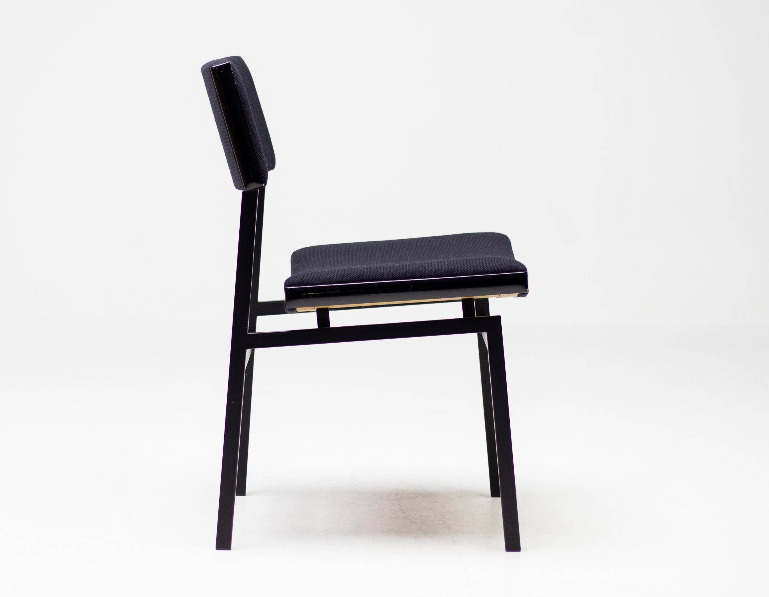 Set of four entirely black Hulmefa dining chairs, Architectural Modernism.