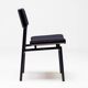 Set of four entirely black Hulmefa dining chairs, Architectural Modernism.