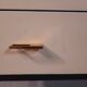 Vintage lacquered top desk with iron structure and pointed brass feet