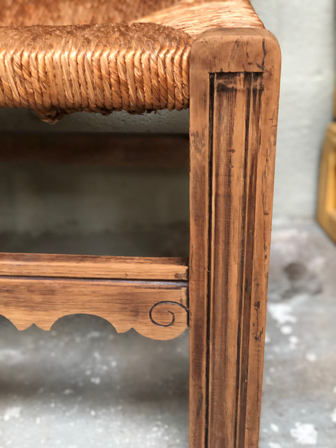 Old straw brutalist chair